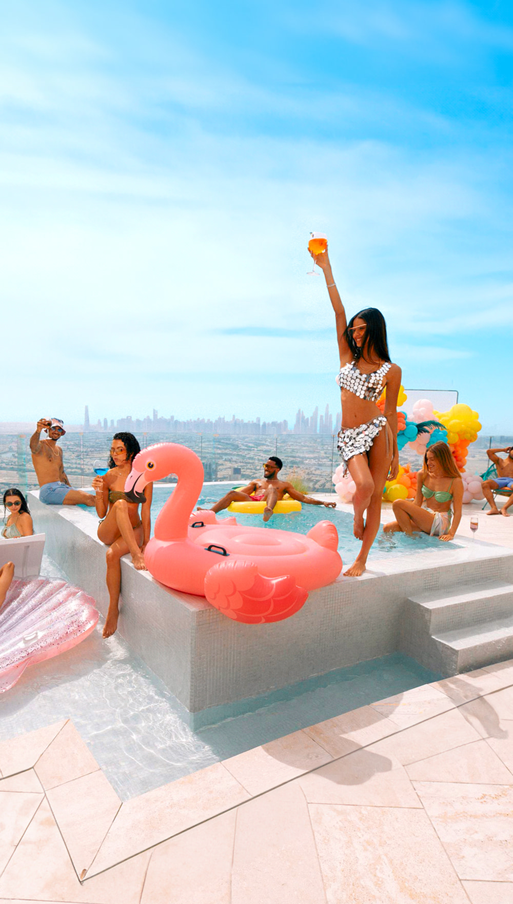 Crays Association community gathering by a skyline pool